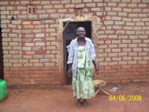 Grandmum- an elderly widow in Nkumba has no roof on her home to protect her from the rain.