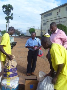 Distribution of soap, toothpaste and brushes, books, pens & flour for the very sick