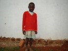 Miriam Mirembe.  She is an orphan brought to the church by someone who knew the parents.  John has never seen her laugh.