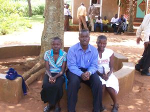 martin-molly-flavia2 2008- Martin with sisters Flavia and Molly, sitting outside the church