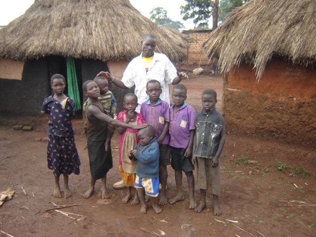 charles-with-orphans Charles with his nieces & nephews prior to sponsorship