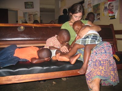 Katie taking children to be de-wormed (in Uganda)