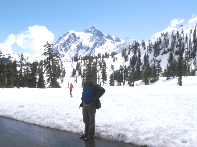 John sees snow for the first time in his life!  Not much snow at the equator!