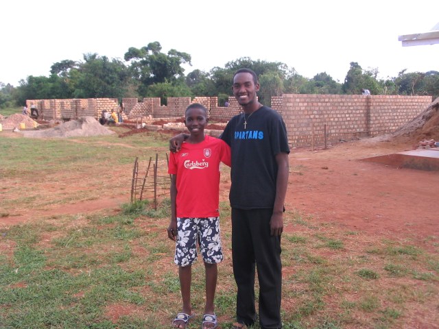 Moses and Isaac Moses and Isaac--in the background is the construction of the 6 new classrooms!