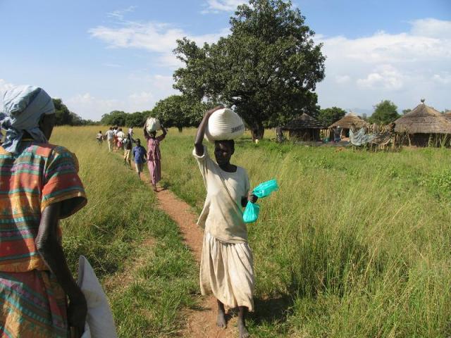 carrying the maize flour carrying the maize flour