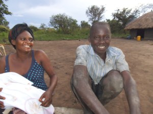 Peter Ogwang is age 14.  He stopped in 5th grade, unable to afford to continue.  He is currently digging to support some of his 8 siblings.